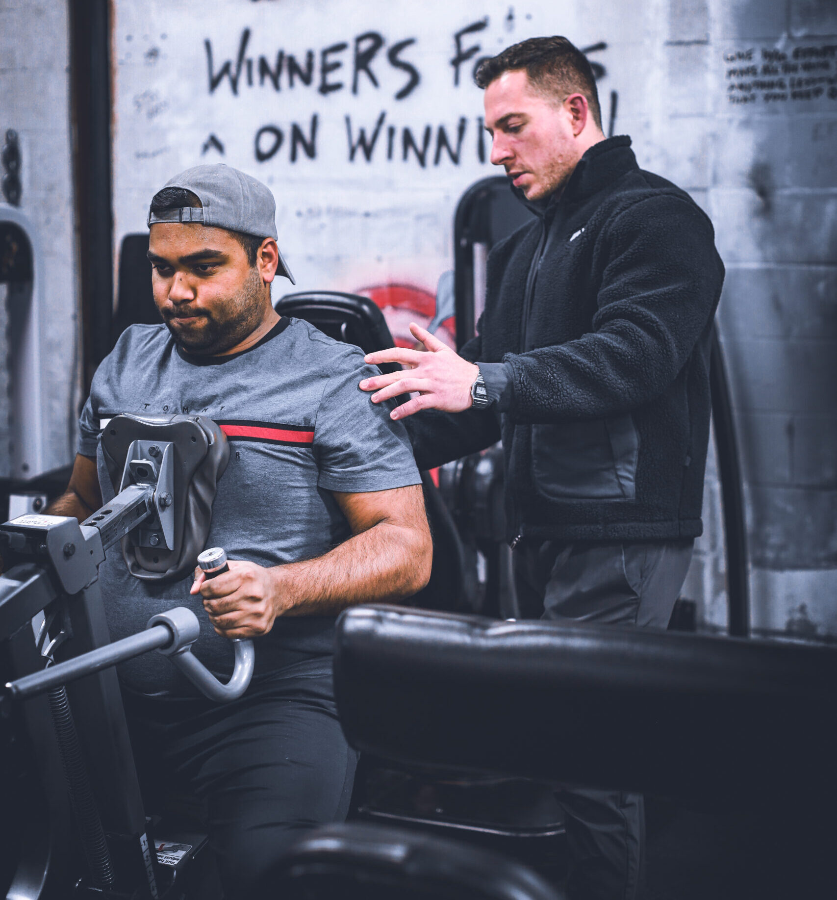 Coach training client at Hammer Fitness