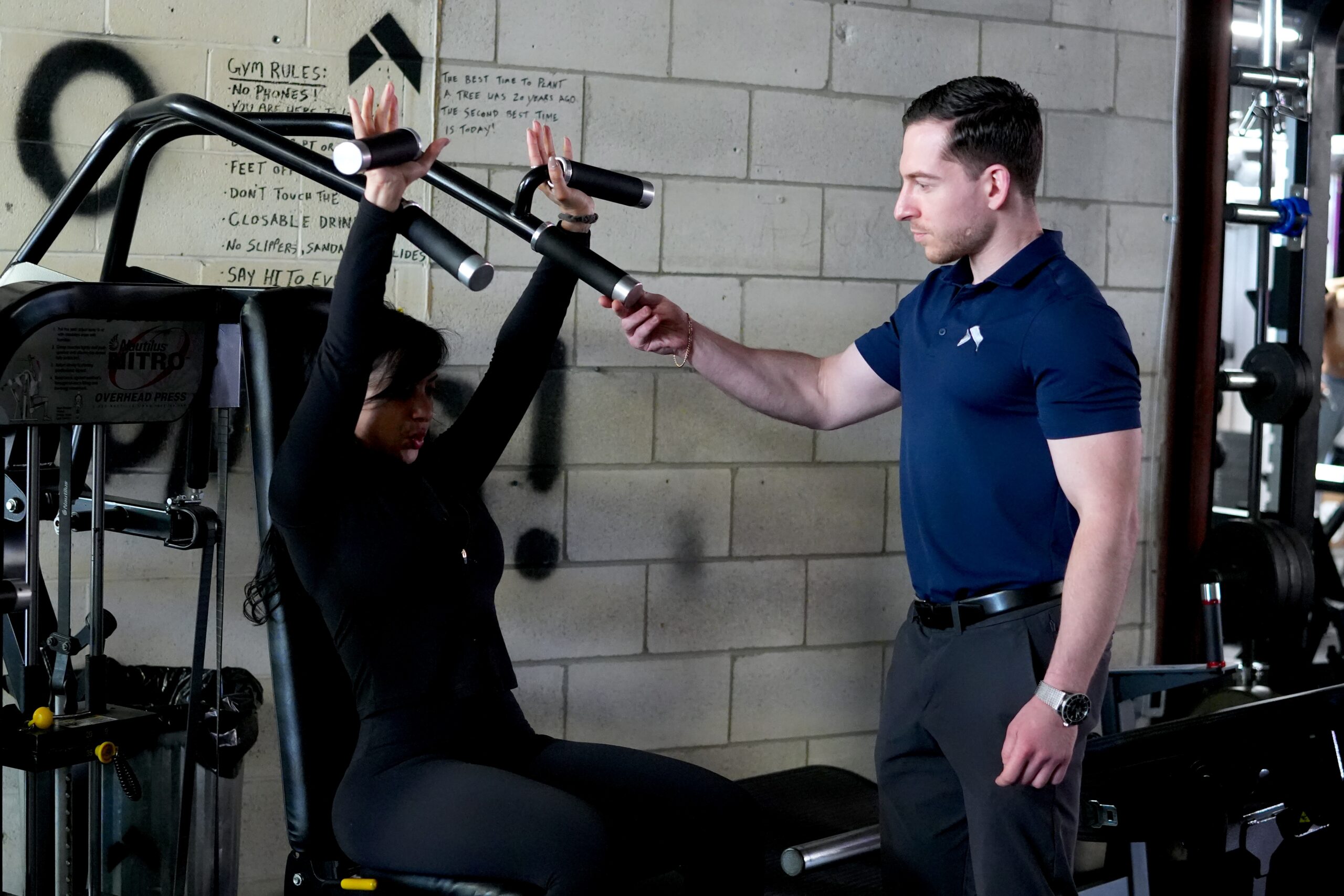 Vlad Krymov coaching a client one-on-one at Hammer Fitness in Scarborough, Toronto