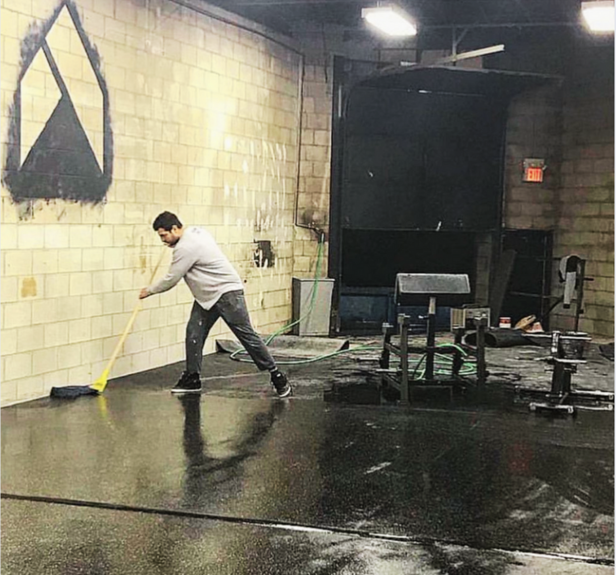 Amer mopping the floor at Hammer Fitness Scarborough