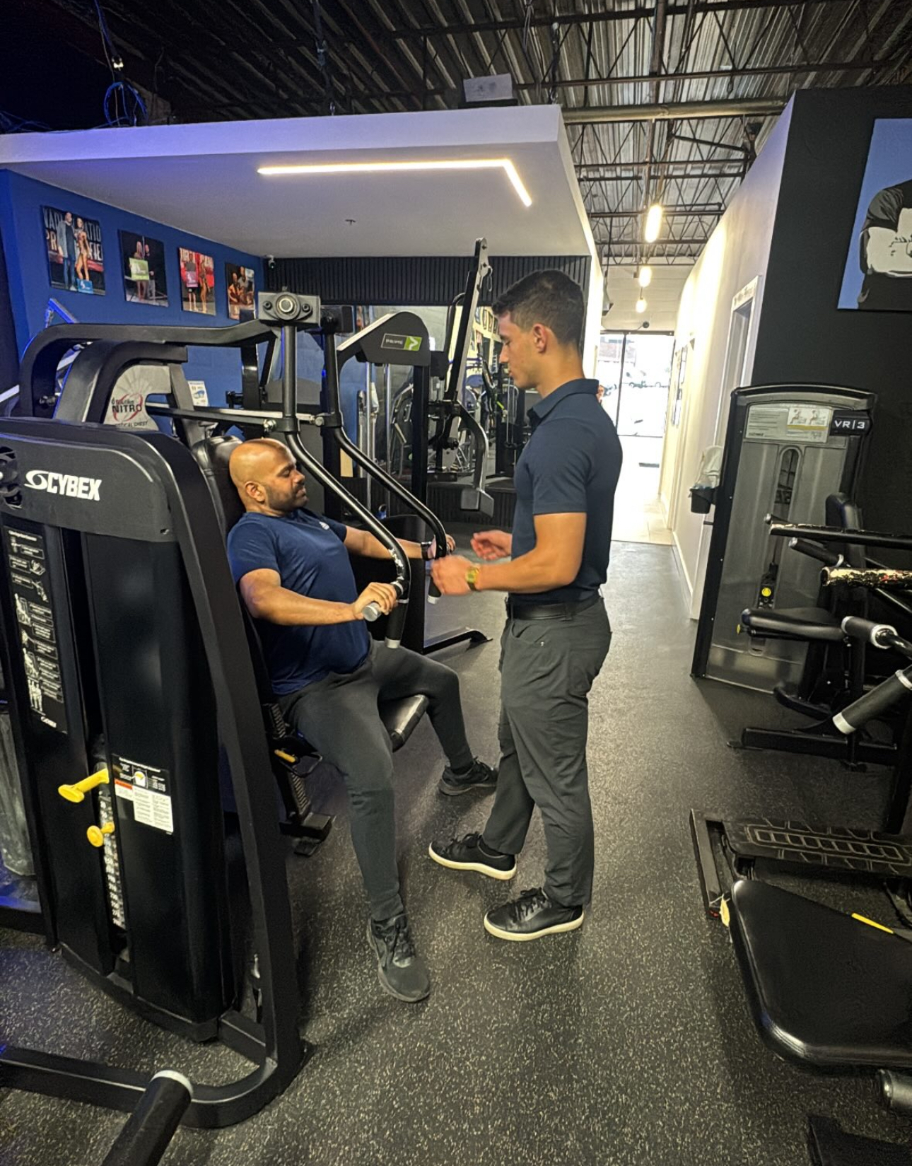 Keyvan Billou coaching a personal training client at Hammer Fitness, Scarborough