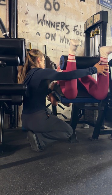 Lindsay Martens coaching a client through a working set at Hammer Fitness, Scarborough