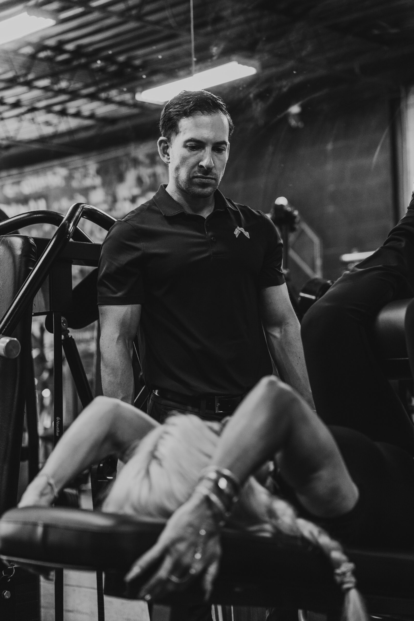 Vlad Krymov coaching a client through a working set at Hammer Fitness, Scarborough Toronto