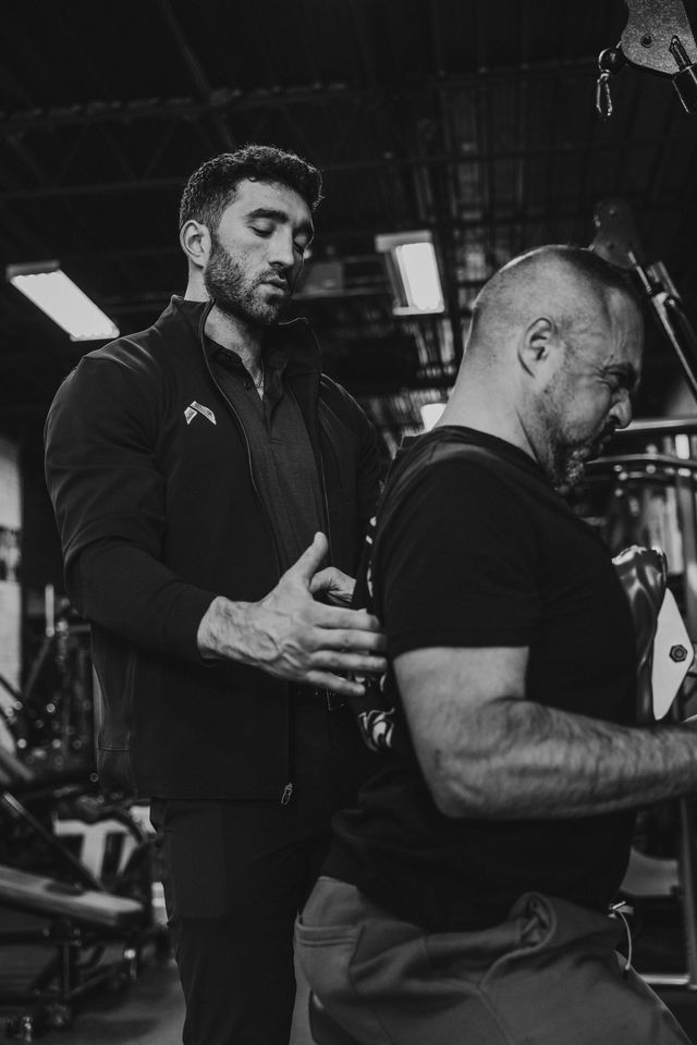 Josh Cooperband running a one-on-one personal training session at Hammer Fitness, Toronto