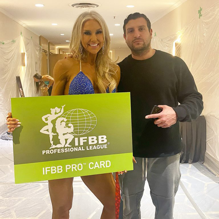 Hammer Fitness athlete winning an IFBB pro card, coached by Amer Kamra