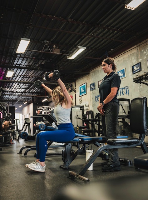 Malvina Mana coaching a client at Hammer Fitness, Scarborough
